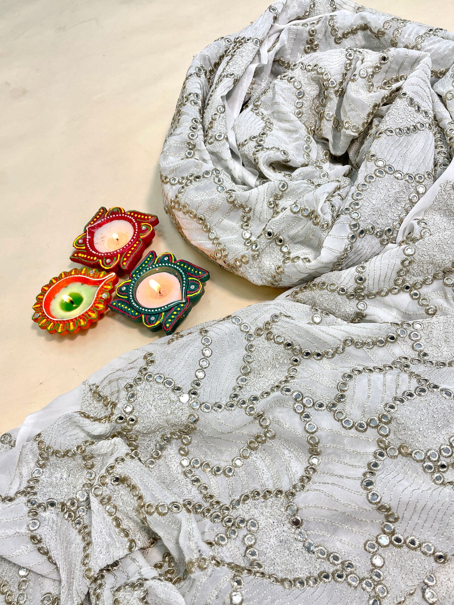 Superb Eye-Catching Exclusive Ethnic Thread Embroidery with Faux Mirror Work on Dyeable Georgette