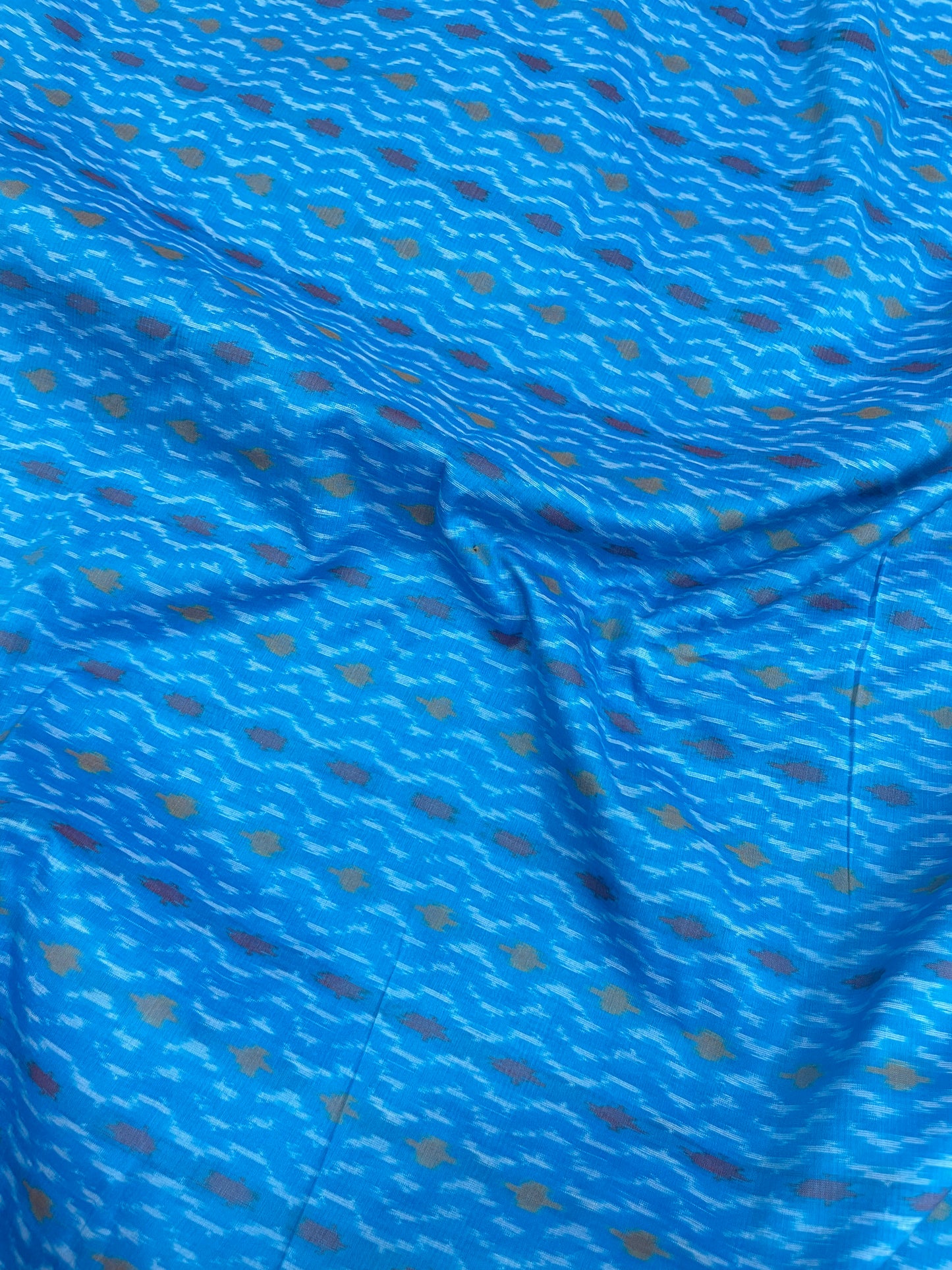 Gorgeous Wavy Multi Color Print On Blue Silk Ikat Fabric