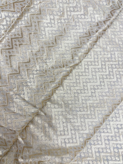 Exquisite Adorable All Over Zig Zag Golden Zari Weaving On White Banarasi Chanderi Jacquard  Fabric