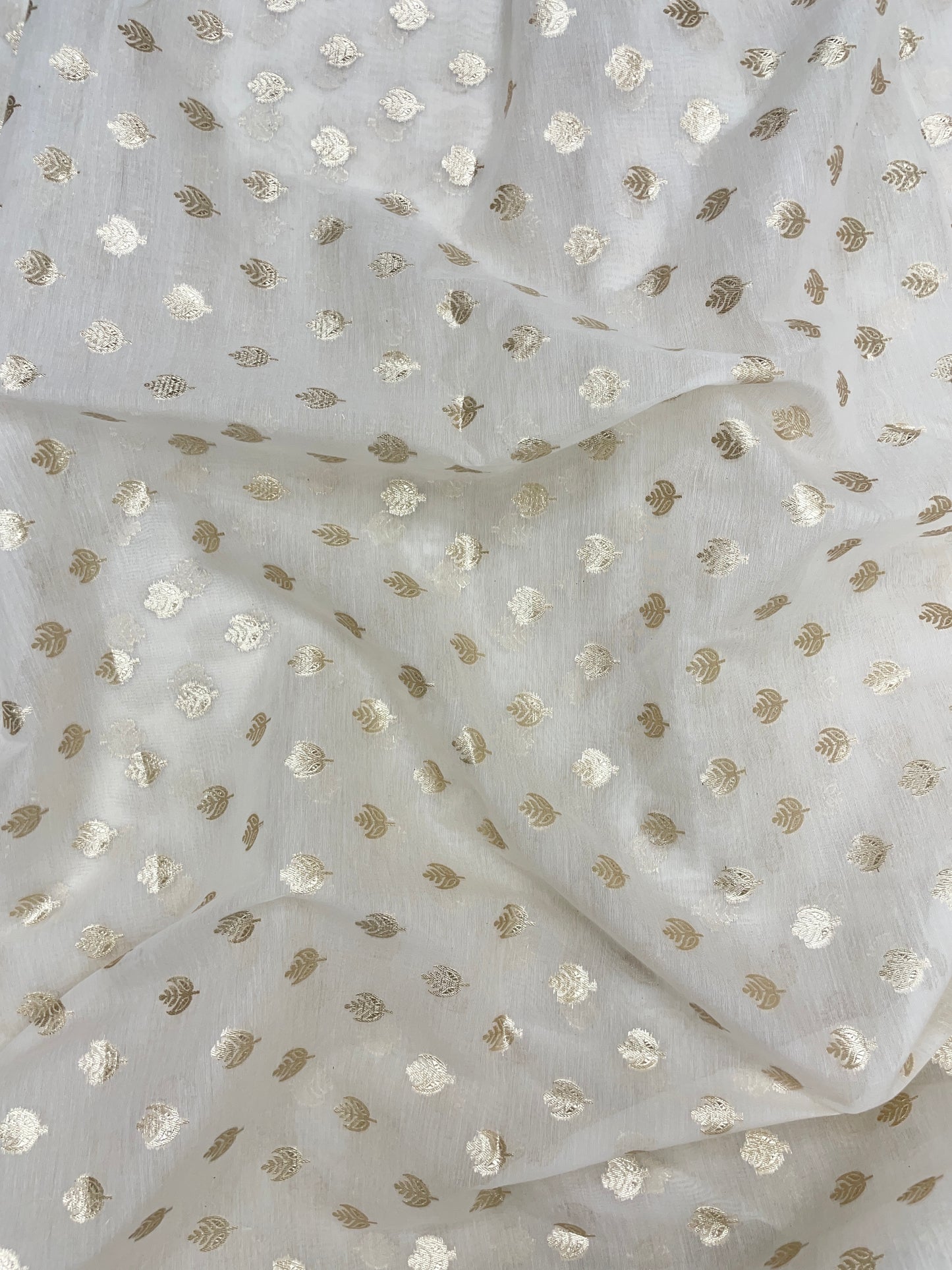 Dainty Eye Catching All Over Motif Golden Zari Weaving On White Dyeable Banarasi Chanderi Jacquard Fabric