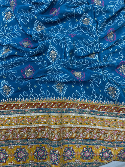 Adorable Bandhani Print With Border Work On Crepe Fabric