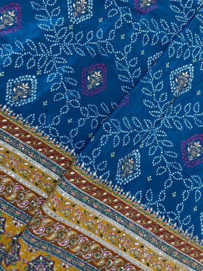 Adorable Bandhani Print With Border Work On Crepe Fabric