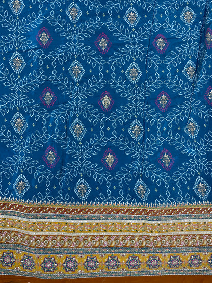 Adorable Bandhani Print With Border Work On Crepe Fabric