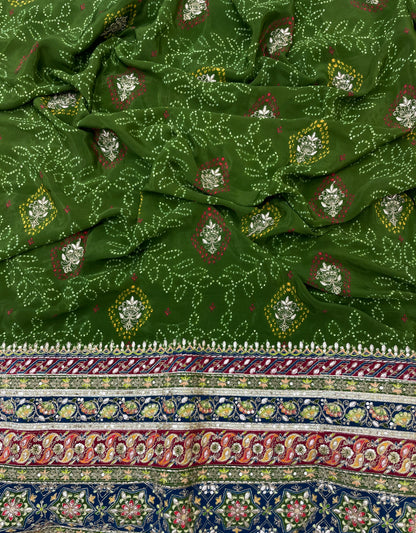 Adorable Bandhani Print With Border Work On Crepe Fabric