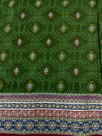 Adorable Bandhani Print With Border Work On Crepe Fabric