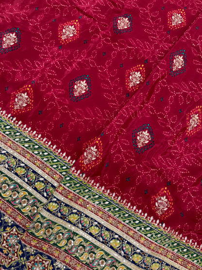 Adorable Bandhani Print With Border Work On Crepe Fabric