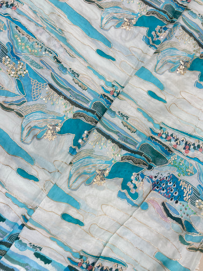 Very Luxurious Multi Color Position Print With Shiny Sequin And Zari Work On Chinon Fabric