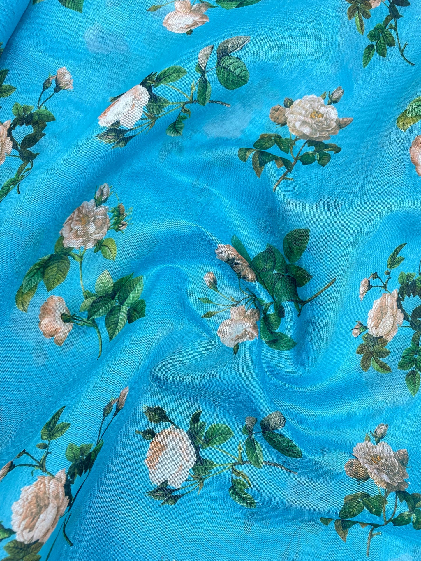 Beautiful Attractive Floral Print On Vibrant Blue Color Chanderi Fabric