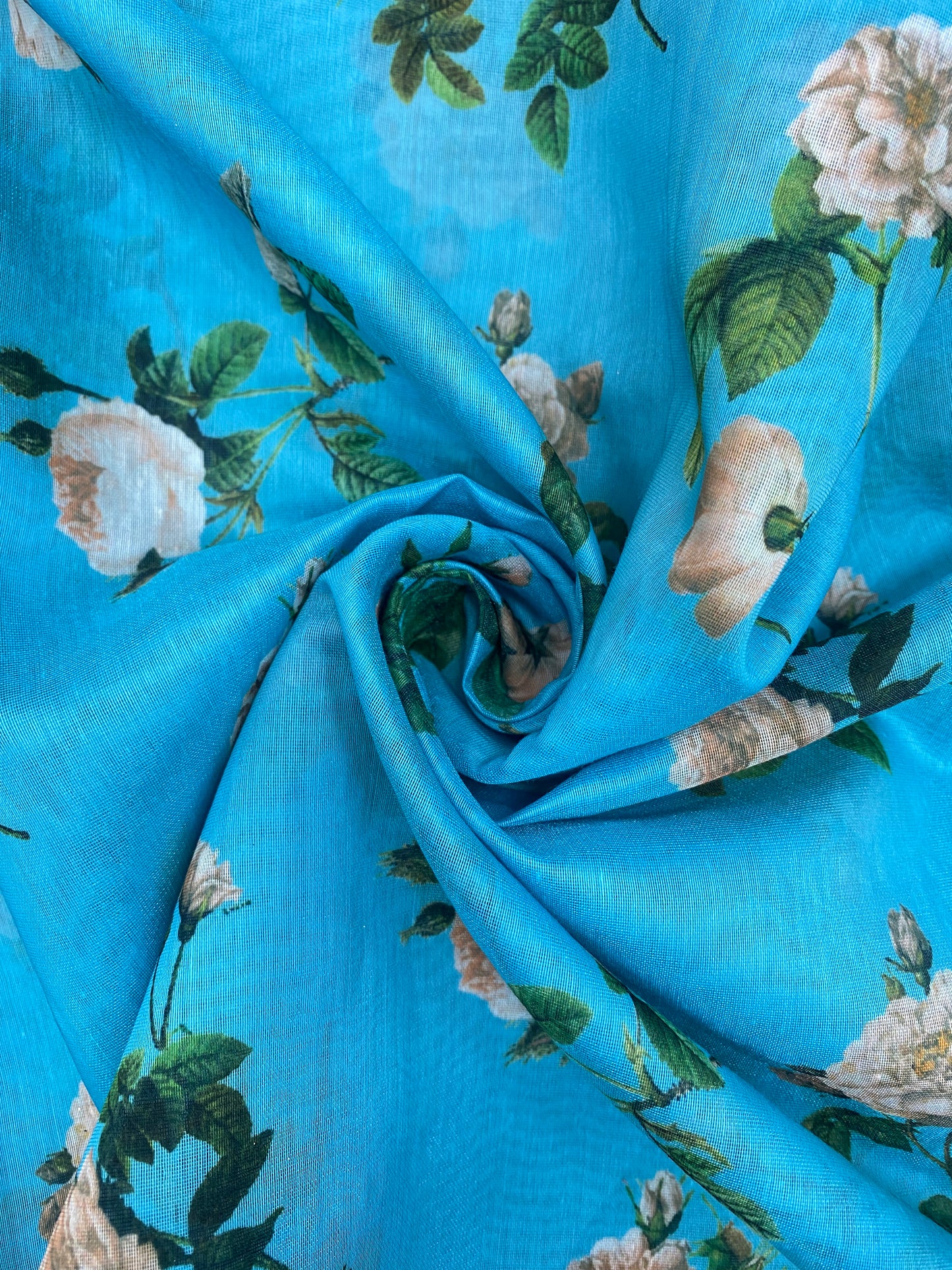 Beautiful Attractive Floral Print On Vibrant Blue Color Chanderi Fabric