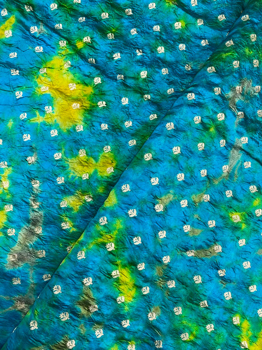 Glorious Vibrant Multi Color Shibori Print With Golden Zari Butti Weaving On Chiniya Silk Fabric