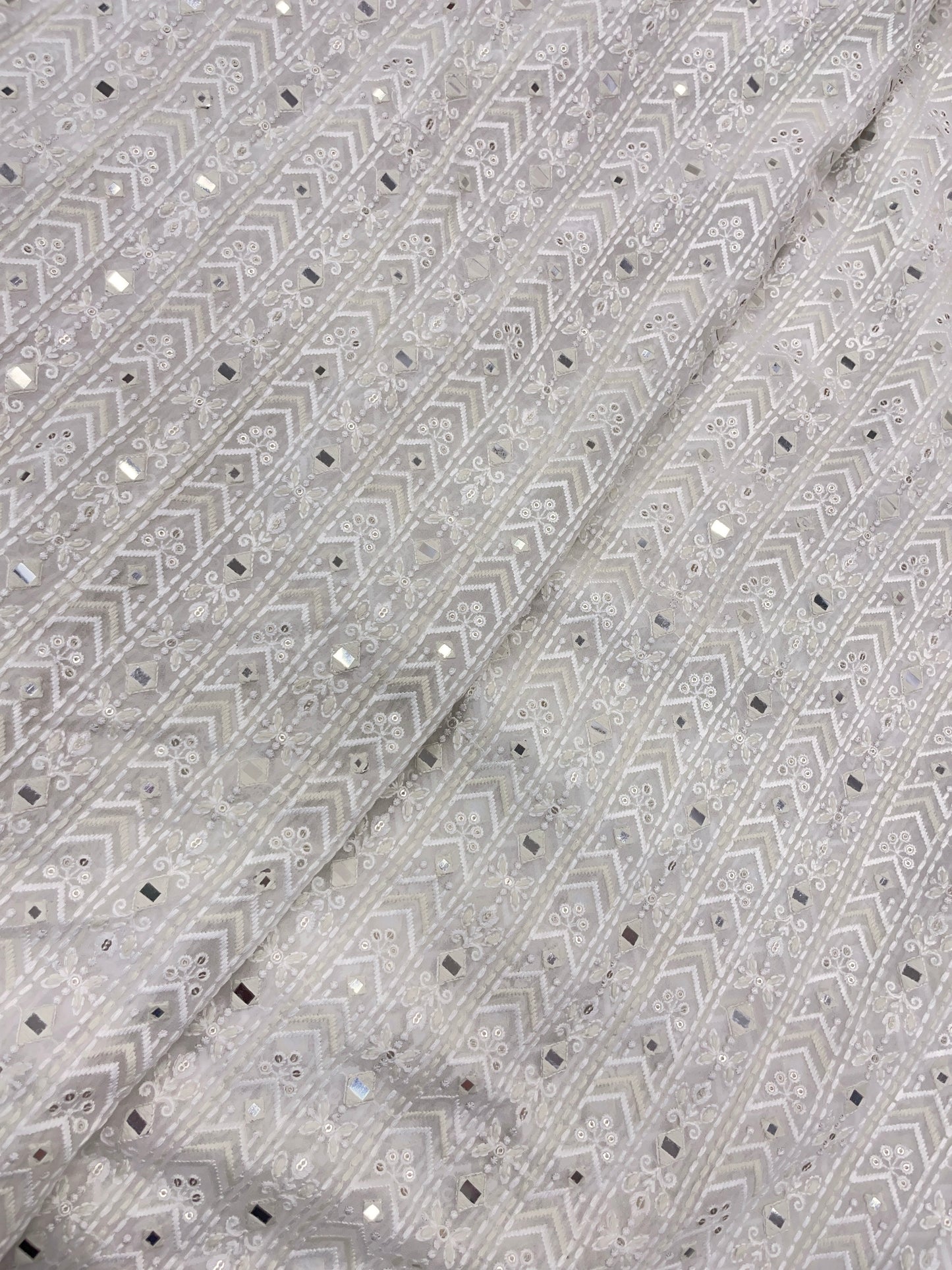 Classy Luxurious Thread Embroidery with Faux Mirror And Sequins Work on Dyeable Georgette