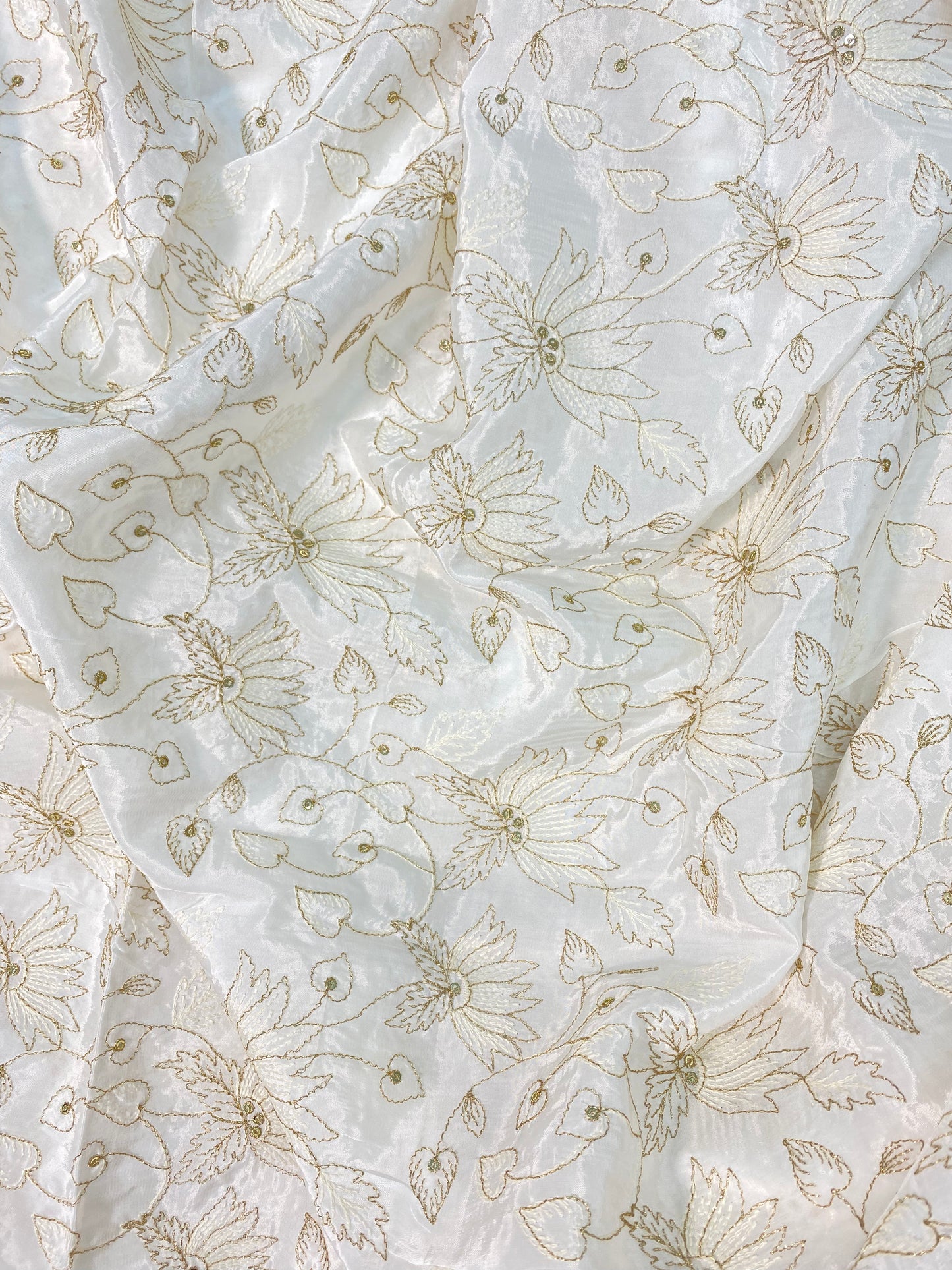 Brilliant Floral And Leafy Zari Embroidery With Sequin Work On White Dyeable Crepe Fabric