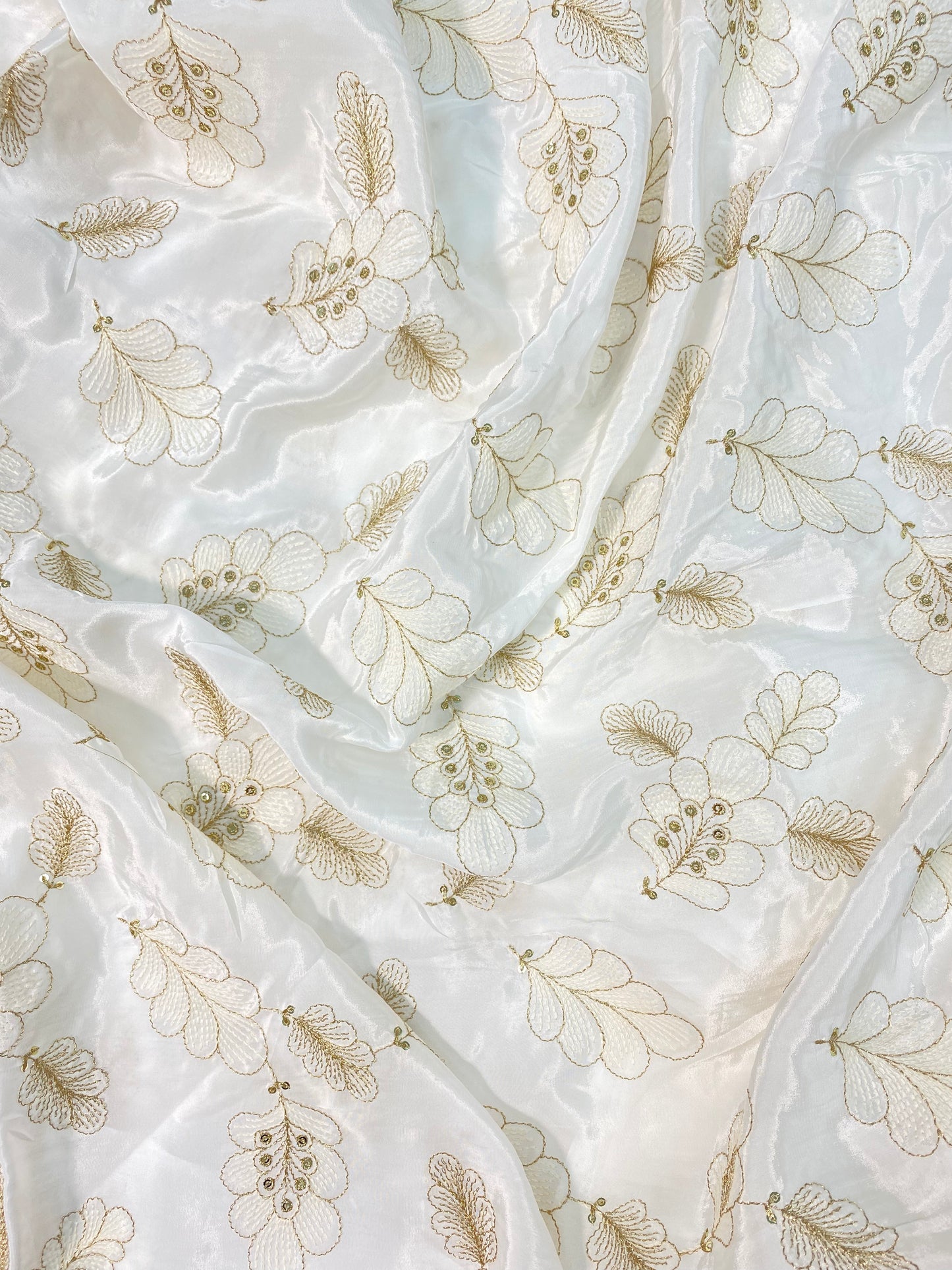 Luxurious Appealing Leafy Zari Embroidery With Sequin Work On White Dyeable Crepe Fabric