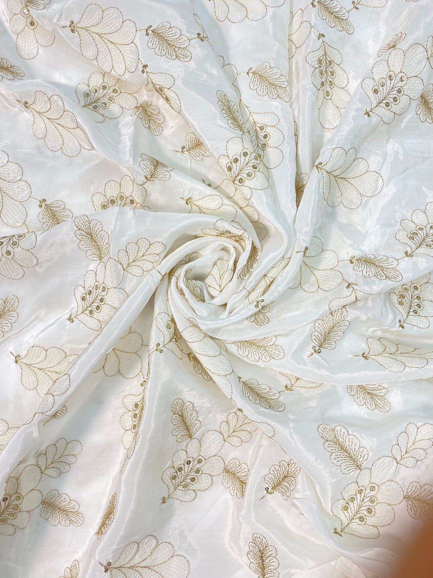 Luxurious Appealing Leafy Zari Embroidery With Sequin Work On White Dyeable Crepe Fabric