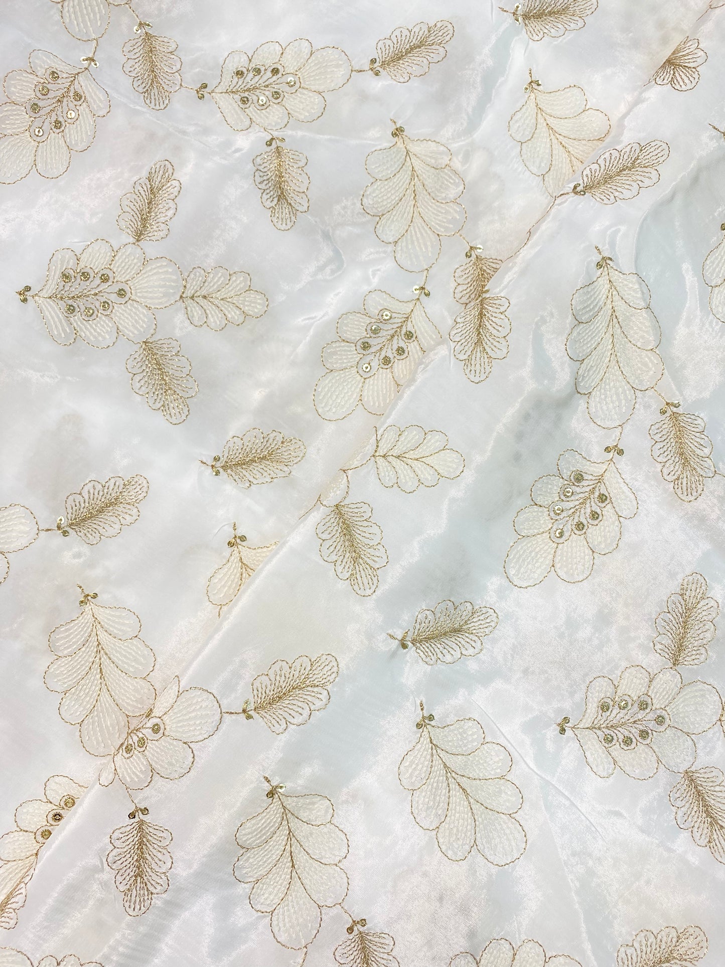 Luxurious Appealing Leafy Zari Embroidery With Sequin Work On White Dyeable Crepe Fabric