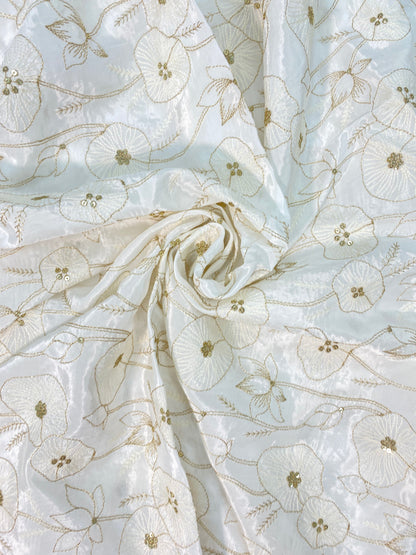 Subtle Yet Elegant Floral Thread And Zari Embroidery With Shiny Sequin Work On White Dyeable Crepe Fabric