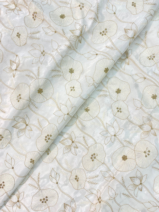 Subtle Yet Elegant Floral Thread And Zari Embroidery With Shiny Sequin Work On White Dyeable Crepe Fabric