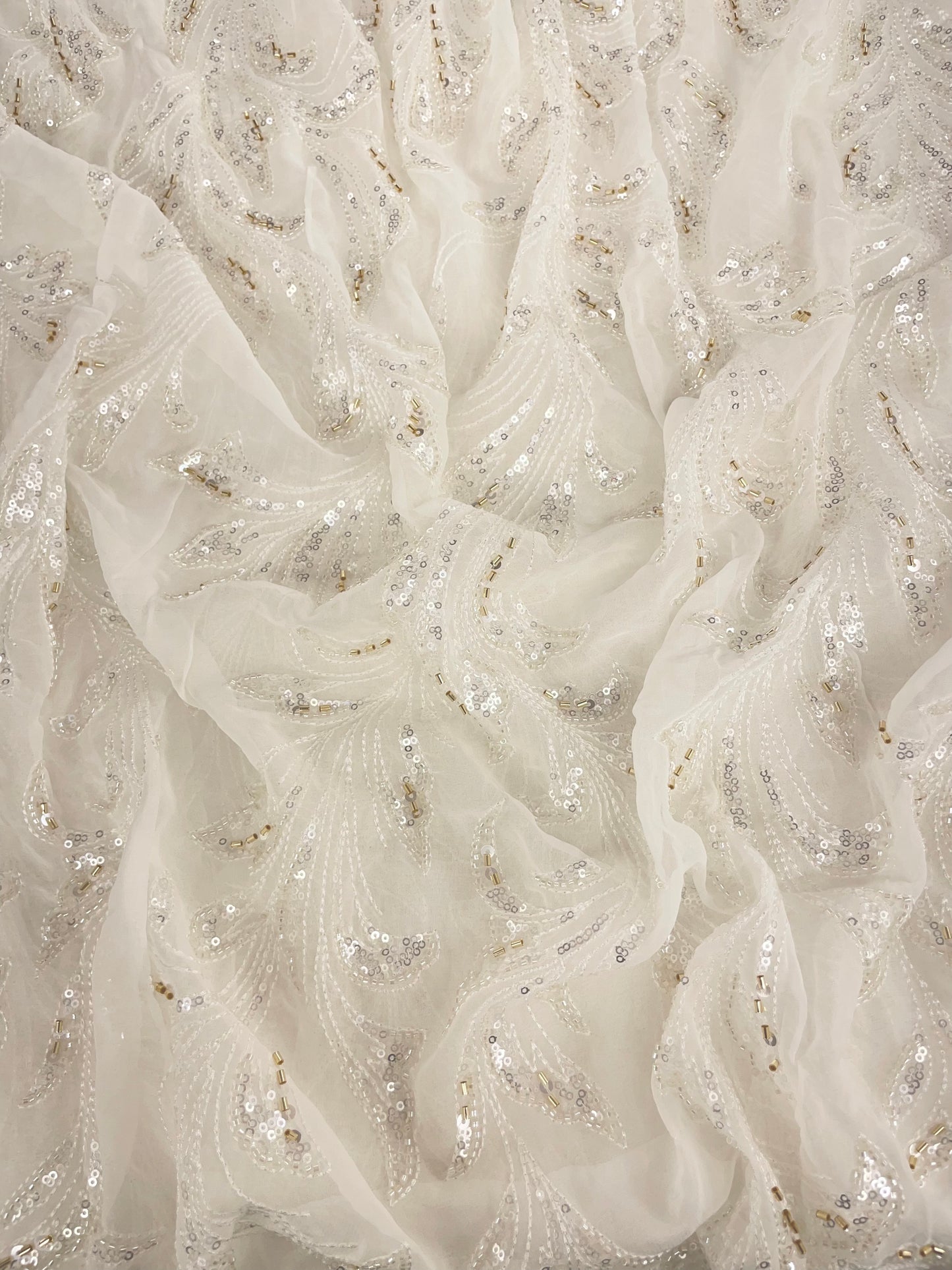 Elegant Classic Self Thread Embroidery With Silver Sequin And Golden Cut Dana Work On White Dyeable Georgette Fabric