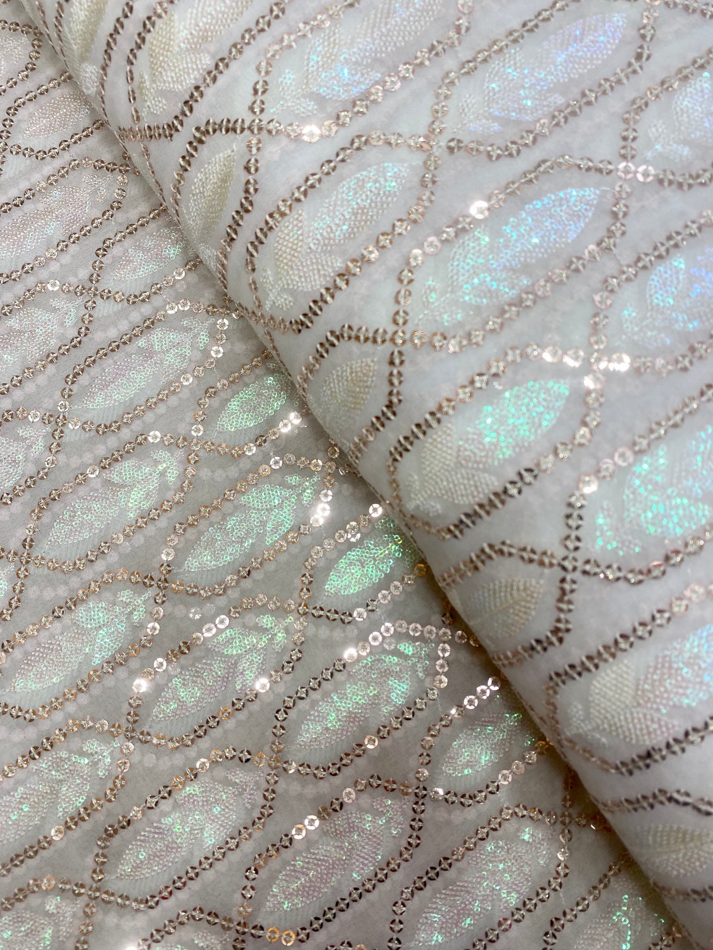 Unique And Attractive Rose Gold Sequin Embroidery Knitted With Premium Rainbow Sequin Work On White Dyeable Viscose Georgette Fabric