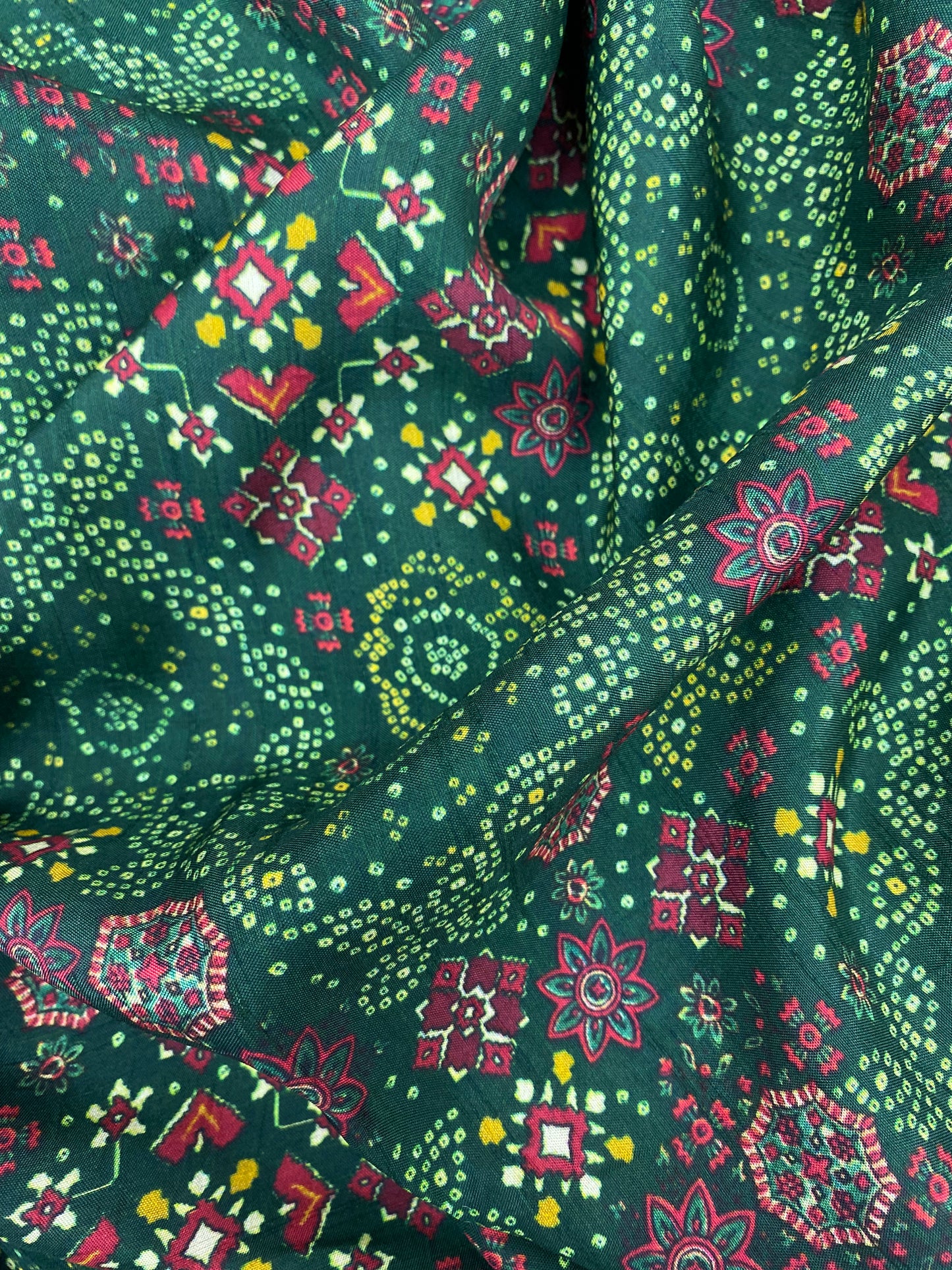 Lavish Extraordinary Traditional Bandhani Print On Green Color Dola Silk Fabric