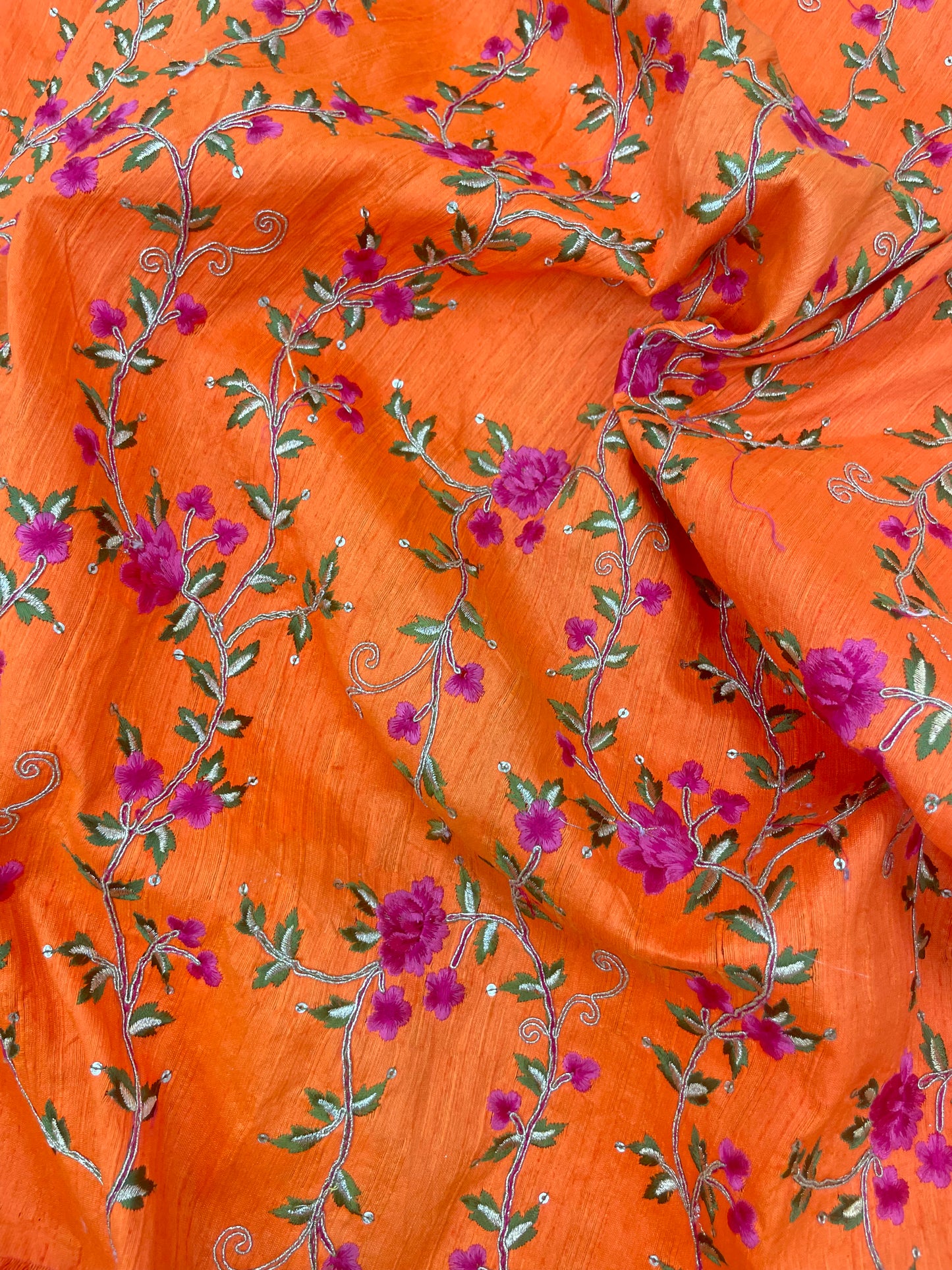 Brilliant Eye Catching Floral Pink Thread Embroidery With Zari And Dainty Sequin Work On Orange Mulberry Silk Fabric