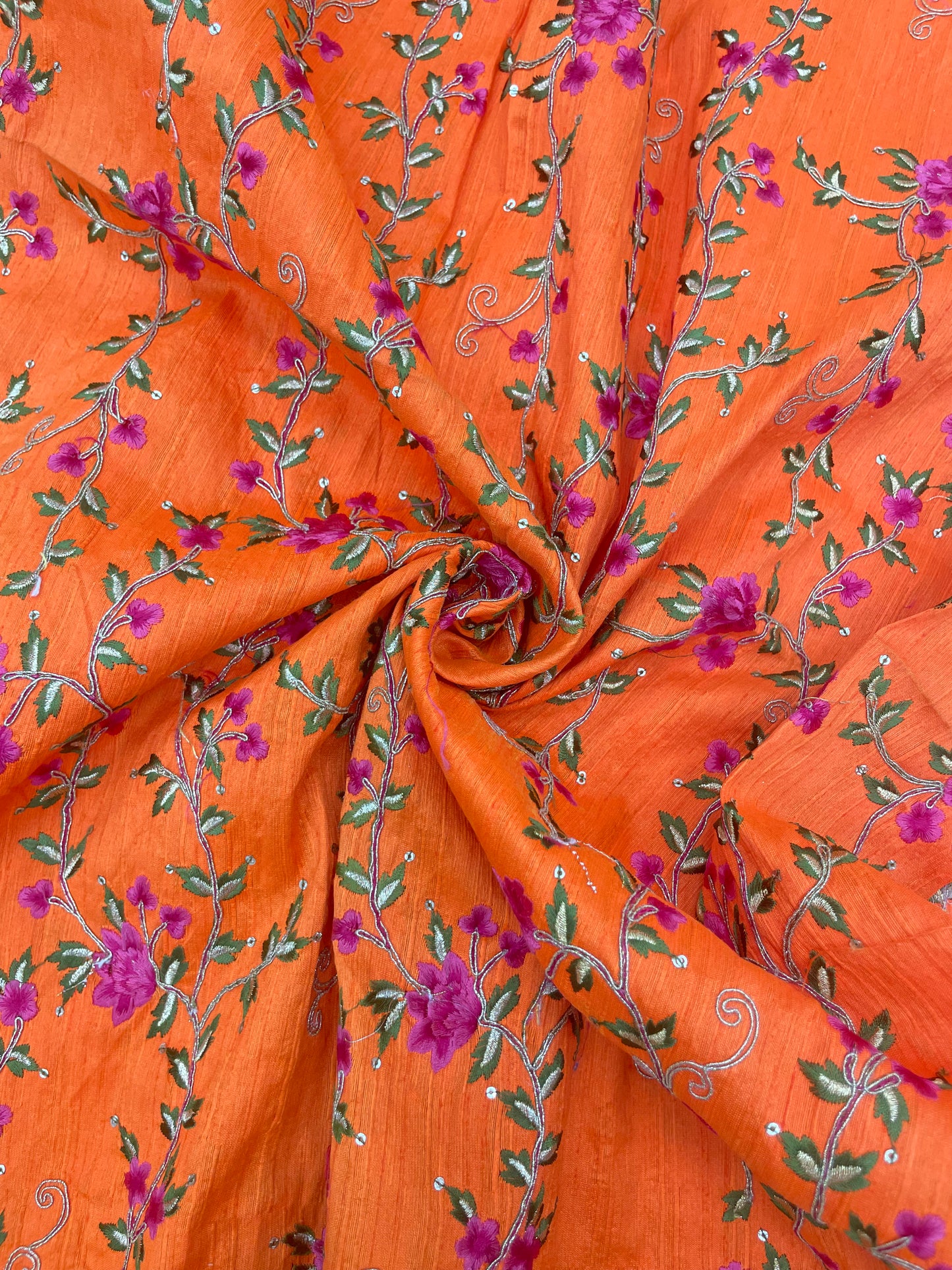 Brilliant Eye Catching Floral Pink Thread Embroidery With Zari And Dainty Sequin Work On Orange Mulberry Silk Fabric