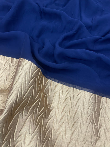 Subtle Yet Elegant Plain Blue Dye With Heavy Golden Border On Georgette Fabric