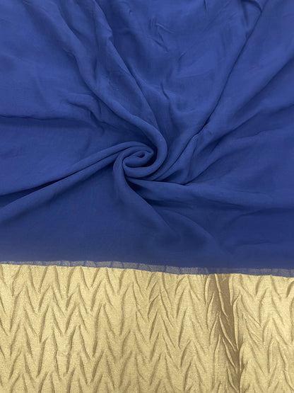 Subtle Yet Elegant Plain Blue Dye With Heavy Golden Border On Georgette Fabric