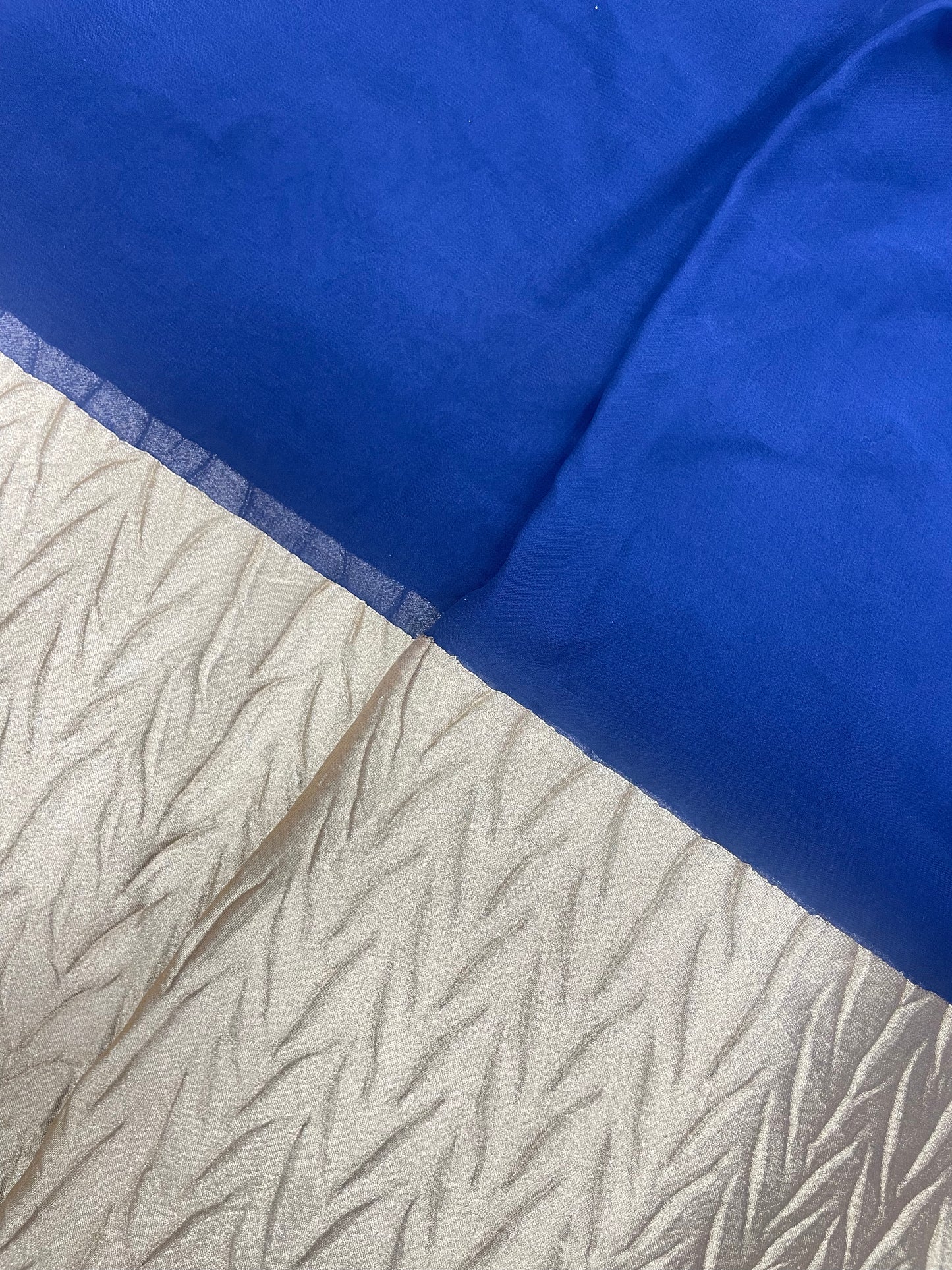 Subtle Yet Elegant Plain Blue Dye With Heavy Golden Border On Georgette Fabric