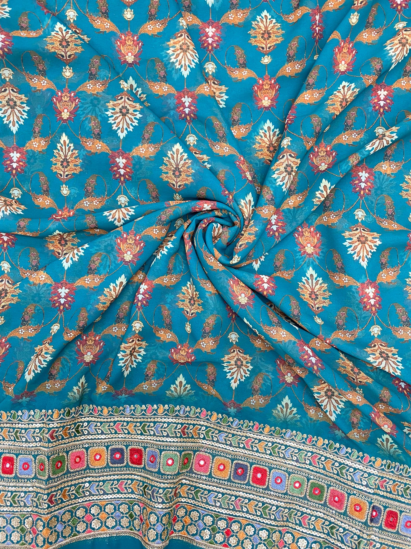 Gorgeous Ethnic Floral Print With Traditional Thread Embroidery And Faux Mirror Work On Georgette Fabric