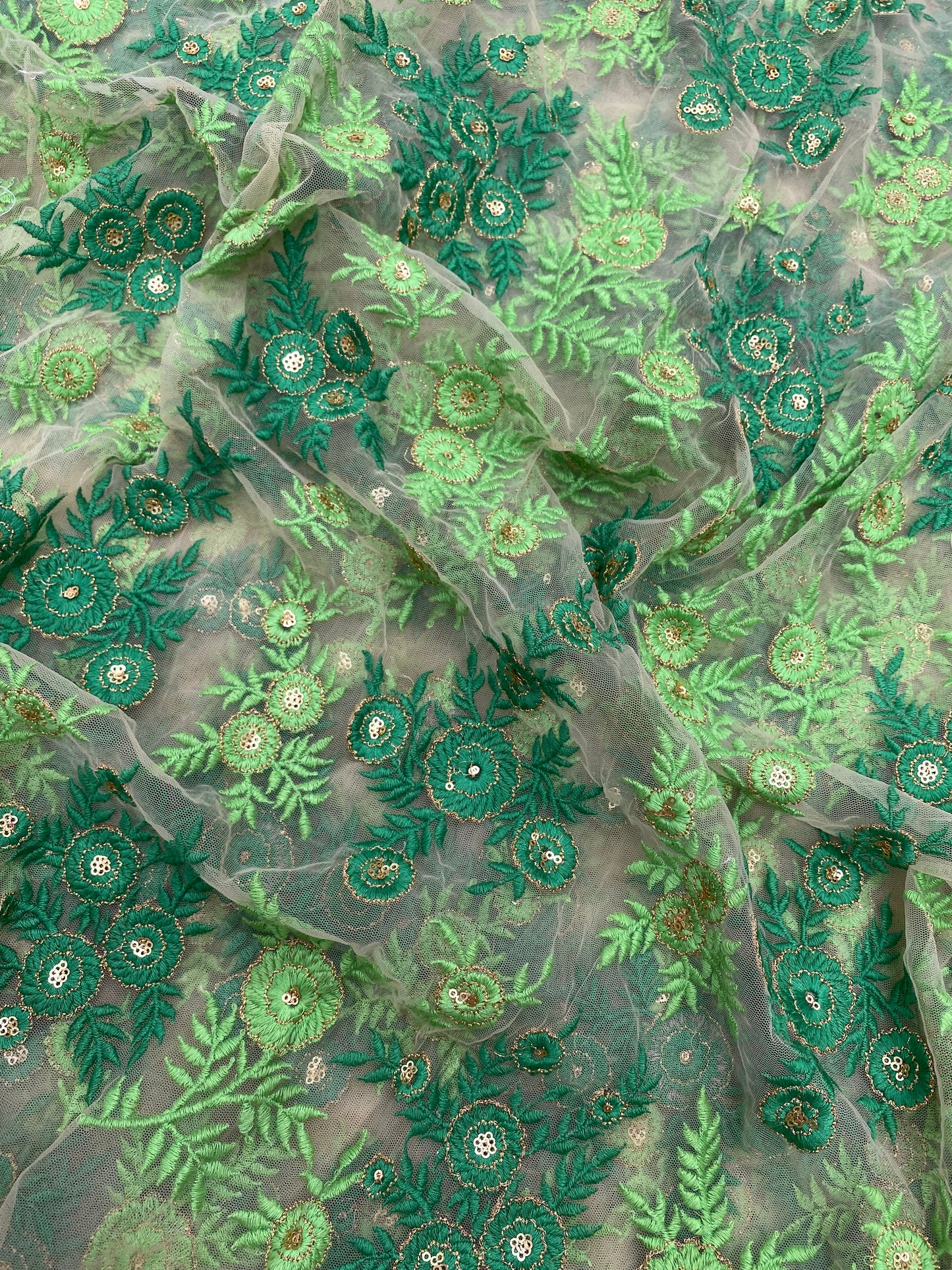 Eye Catching Green Floral Thread Embroidery With Sequin Work On Net Fabric