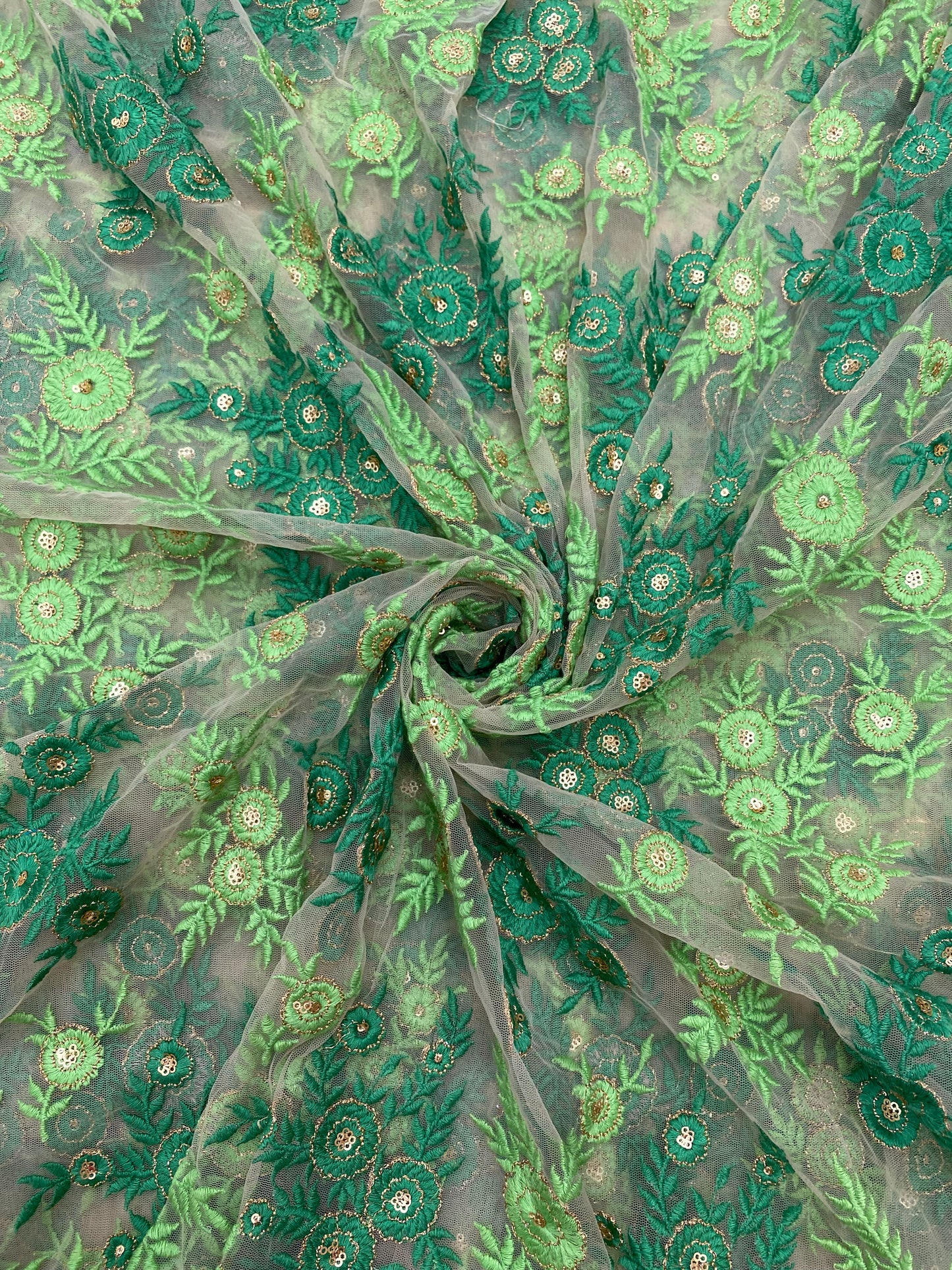 Eye Catching Green Floral Thread Embroidery With Sequin Work On Net Fabric