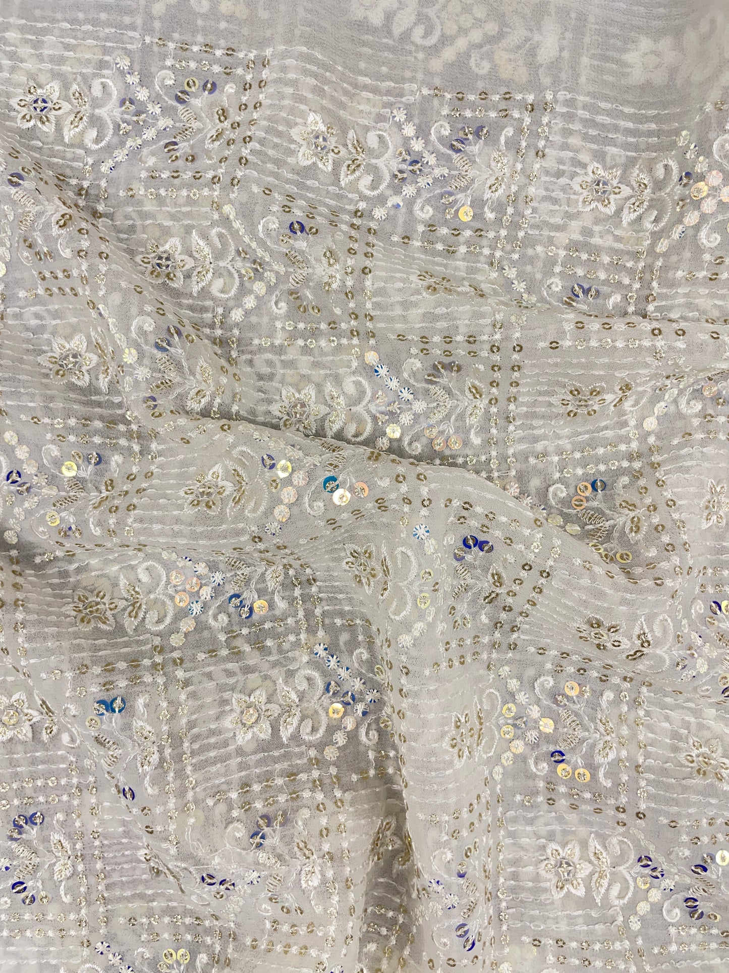 Beautiful Adorable All Over White Thread Embroidery with Multicolor Sequin Work On White Dyeable Georgette Fabric