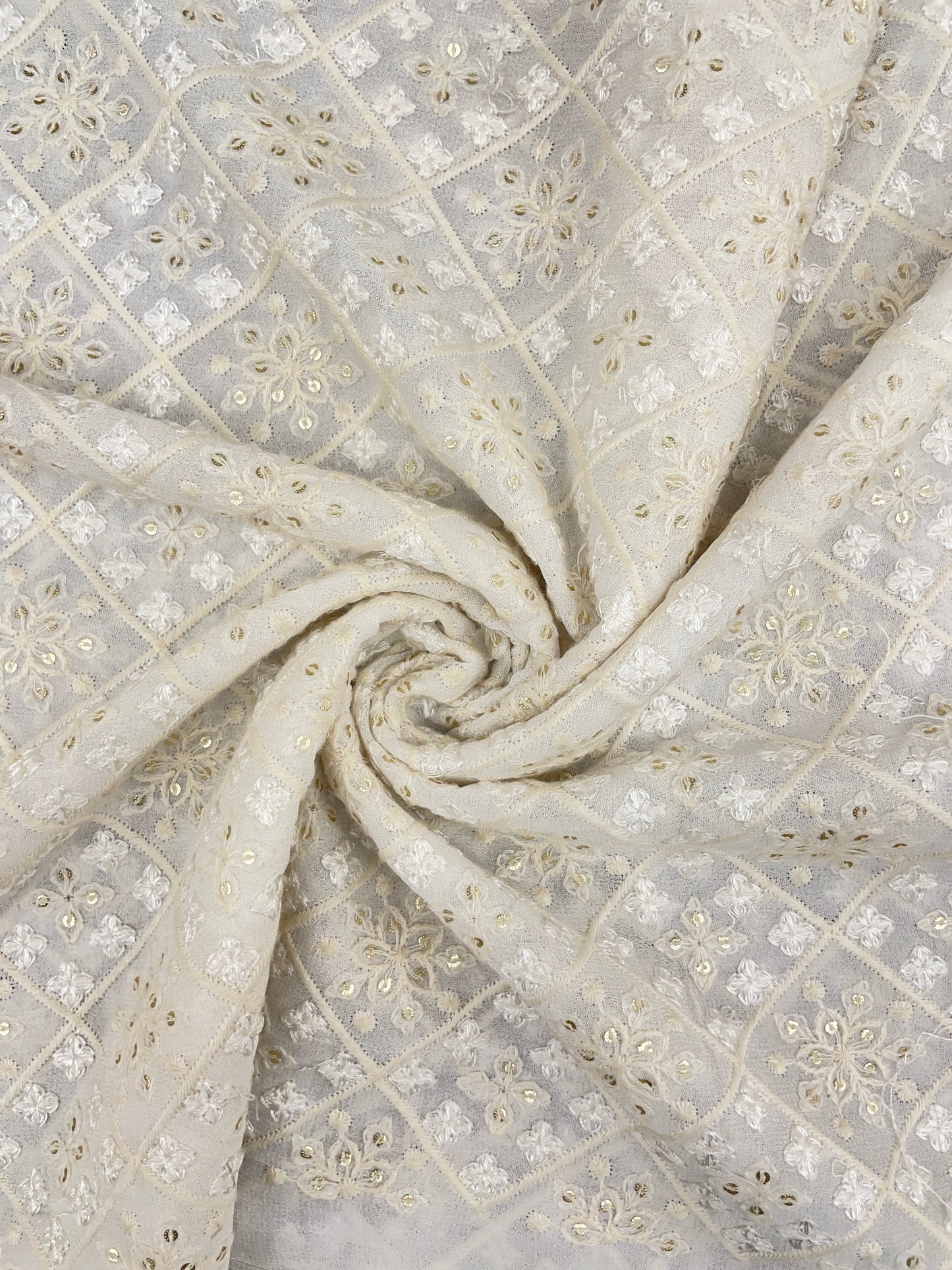 Premium Eye Catching All Over White And Off White Thread Embroidery With Sequin Work On White Dyeable Georgette Fabric