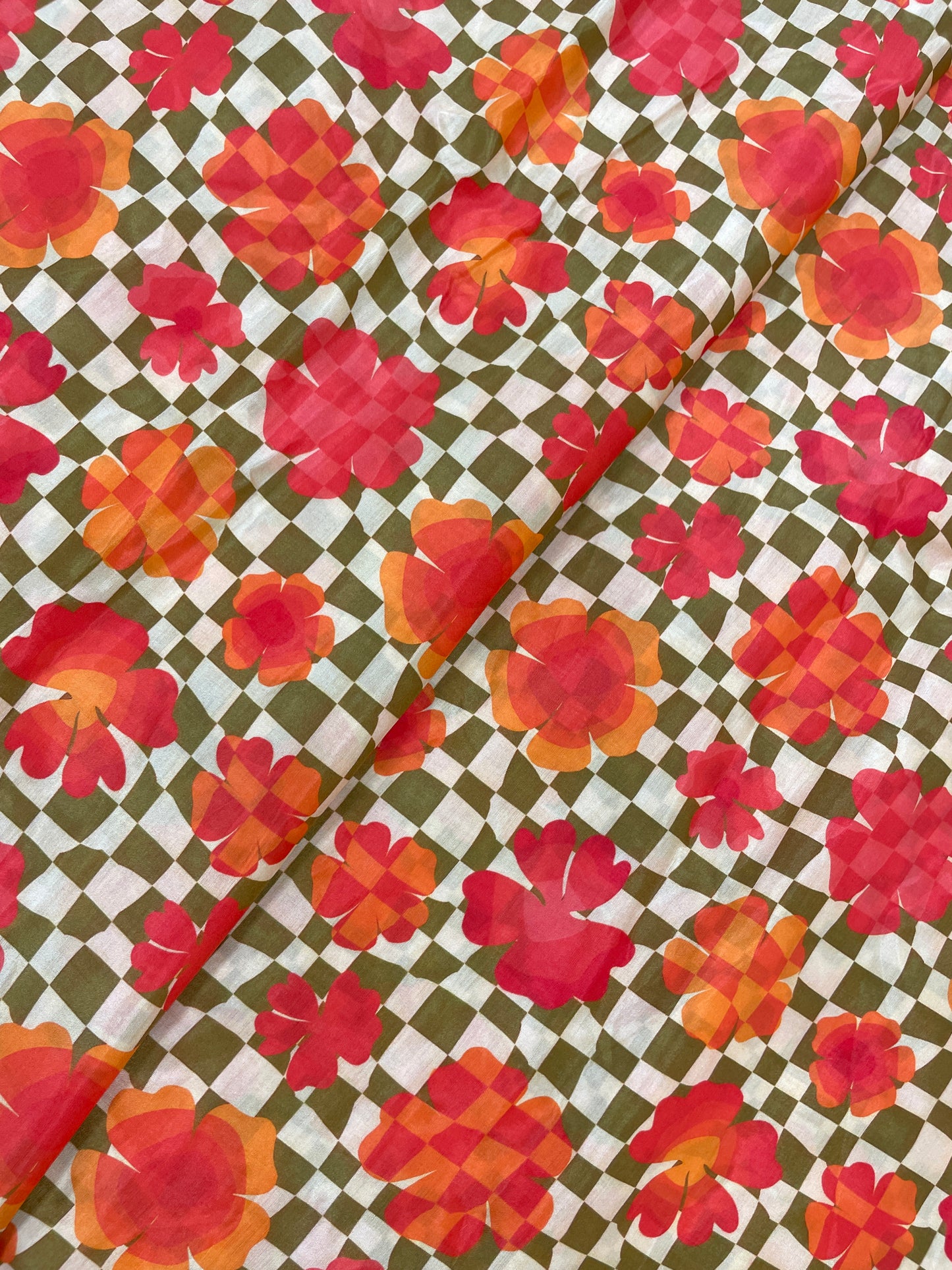 Pretty Adorable Floral Digital Print With Checks Design On Muslin Fabric