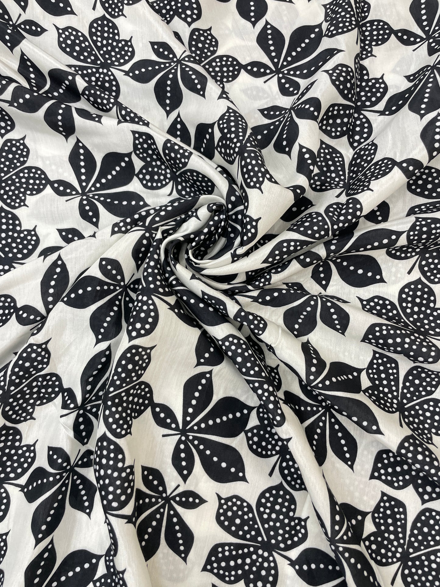 Brilliant Floral And Black & White Leafy Digital Print On Muslin Fabric