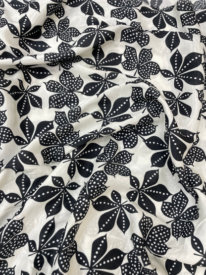 Brilliant Floral And Black & White Leafy Digital Print On Muslin Fabric