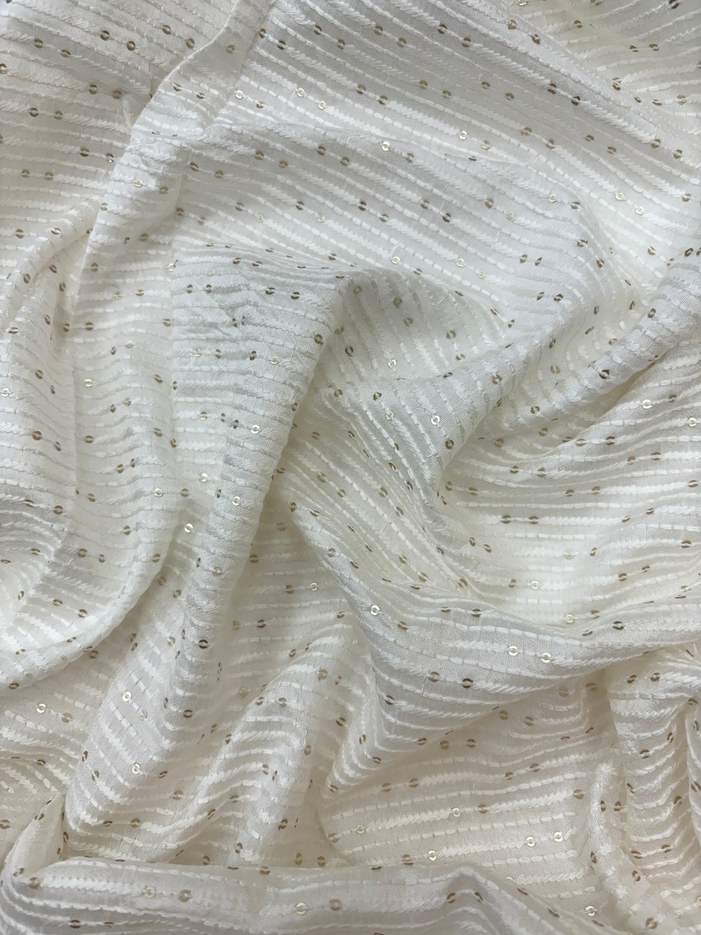 Linear Jacquard Pattern on White Dyeable Mysore Silk Fabric