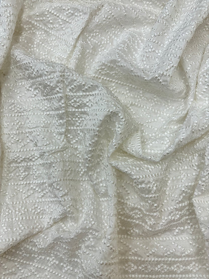 Embossed Dotted Jacquard Pattern on White Dyeable Mysore Silk Fabric