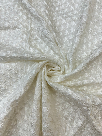 Textured Floral Pattern on White Dyeable Mysore Silk Fabric