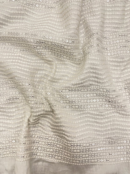 Subtle Yet Elegant Wavy White Thread Embroidery With Sequin Work On White Dyeable Mysore Silk Fabric