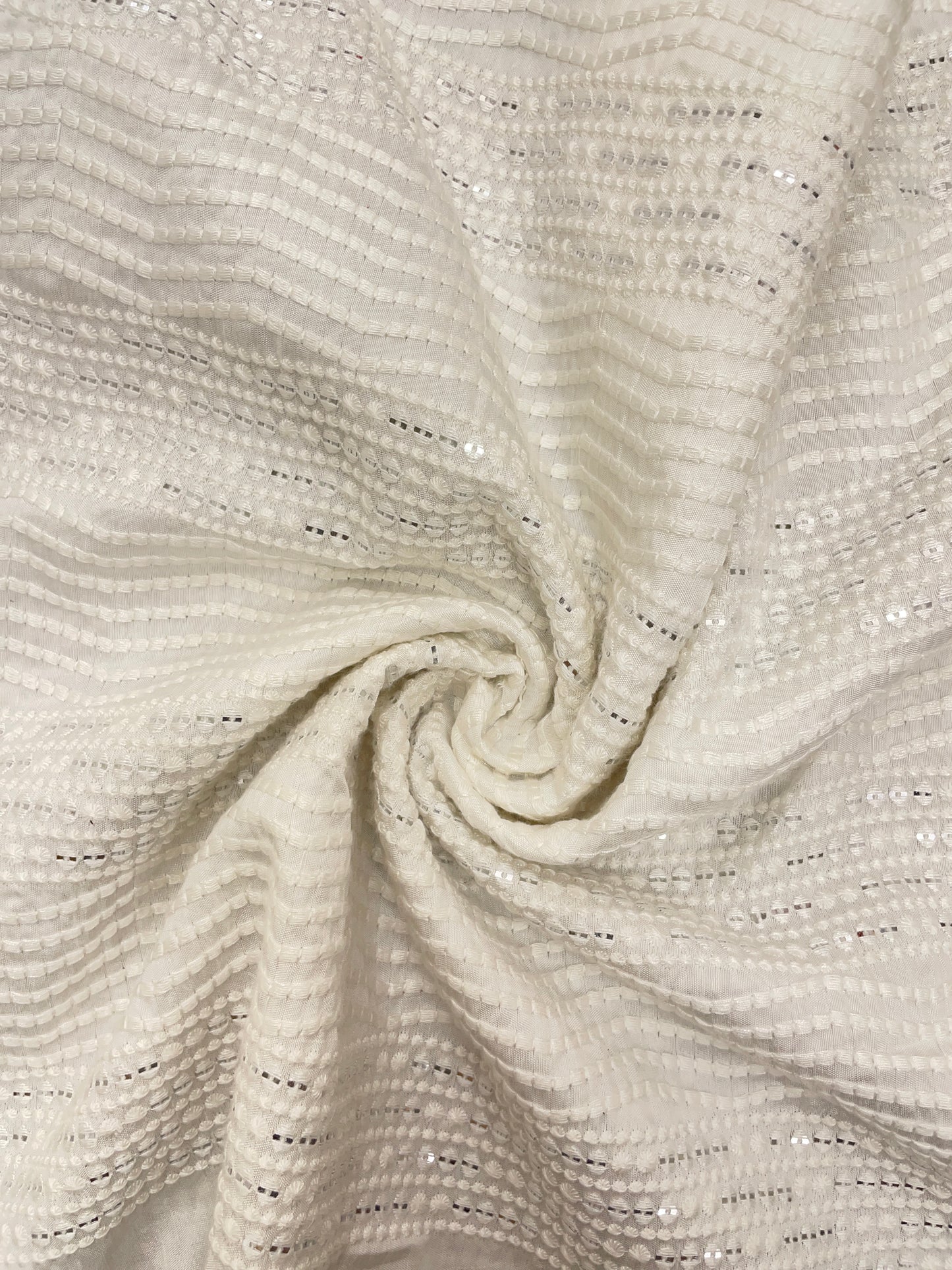 Subtle Yet Elegant Wavy White Thread Embroidery With Sequin Work On White Dyeable Mysore Silk Fabric