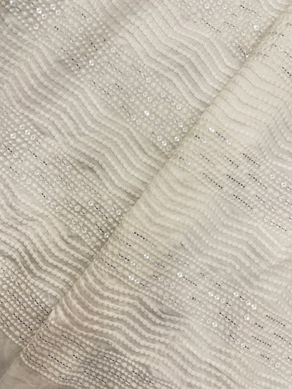 Subtle Yet Elegant Wavy White Thread Embroidery With Sequin Work On White Dyeable Mysore Silk Fabric