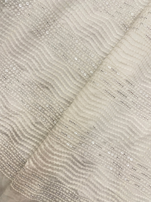 Subtle Yet Elegant Wavy White Thread Embroidery With Sequin Work On White Dyeable Mysore Silk Fabric