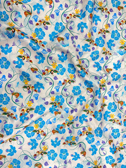 Classic Delicate Blooming Blue Flowers And Dainty Peacock Print On Muslin Fabric