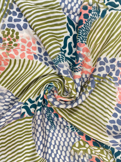 Pleasing Classic Brilliant Abstract Pattern Print On Muslin Fabric