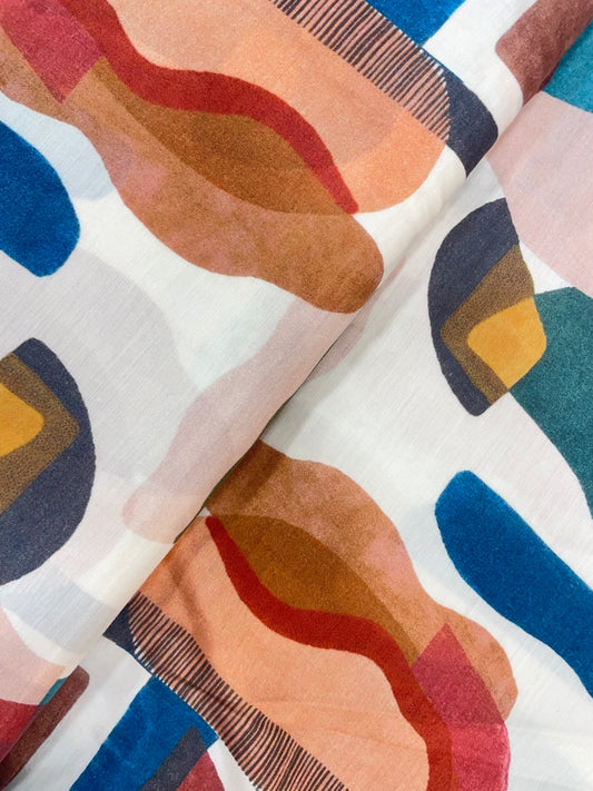 Subtle Yet Elegant Multi Color Print On Muslin Fabric