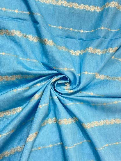 Fabulous Eye Catching Ethnic Dainty Floral And Parallel Line Zari Weaving On Munga Silk Fabric