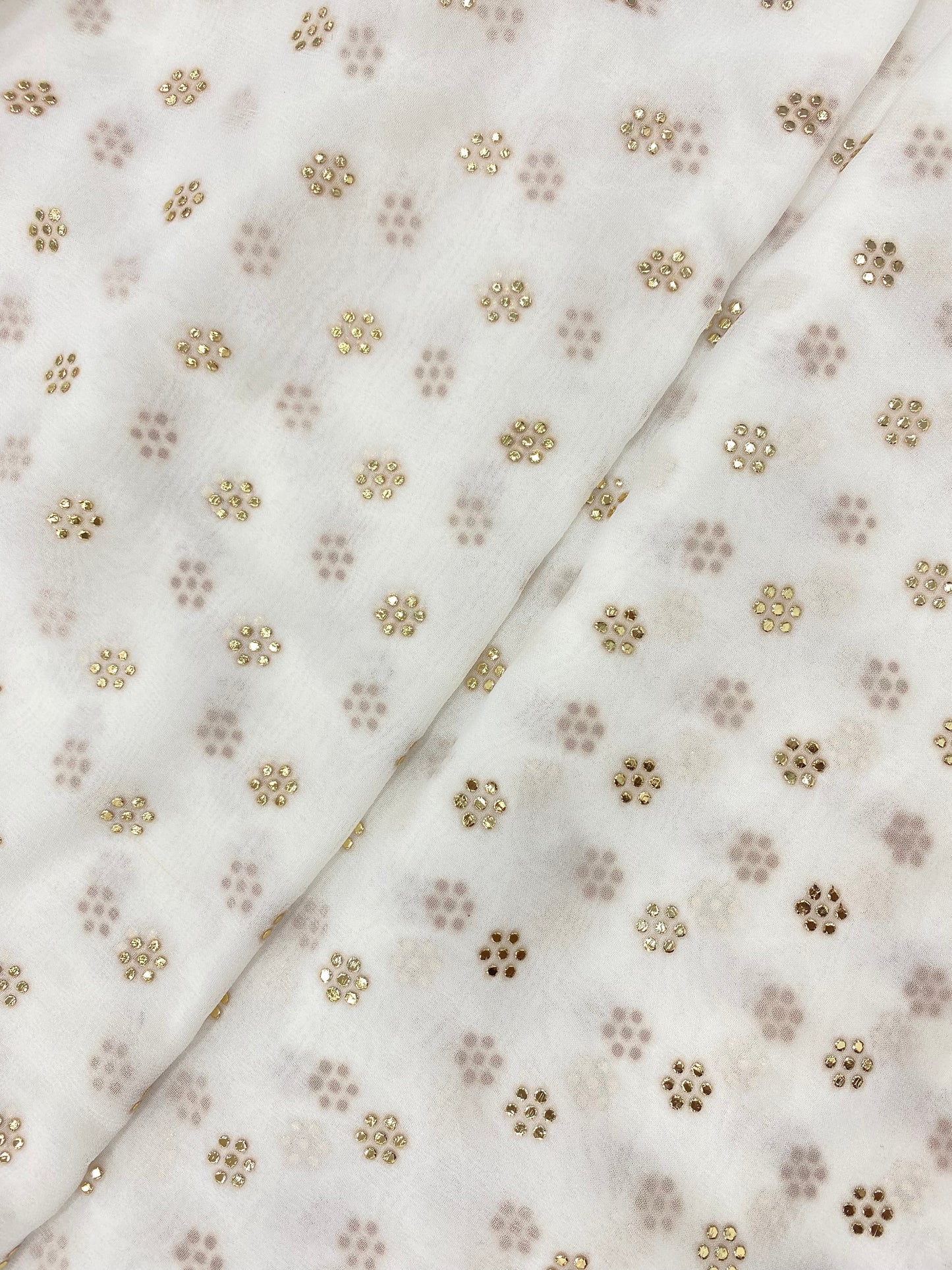 Beautiful Subtle Yet Elegant Golden Floral Mukesh Work On White Dyeable Viscose Organza Fabric