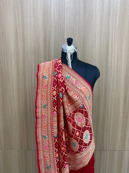 Superb Glorious Pretty Floral Embroidery With Heavy Hand Bandhani Print, Meenakai Work And Premium Golden Zari Work On Pure Khadi Georgette Dupatta